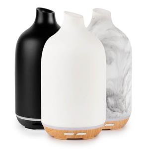 <p>Innovative, modern & stylish the Aroma-Dune cool-mist diffuser features a sleek matt outer cover created from a durable resin material, a statement in its own right.</p>
<p>The Aroma-Dune features an accent strip of colour changing lights at the base which can be set to a specific colour or switched off. Light on or light off, the Aroma-Dune is a beautiful way to diffuse your favourite essential oils.</p>
<p>Diffuse essential oils through out your home and work, and enjoy the wide benefits gained from aromatherapy, while also purifying the air you breathe..</p>
<p>Our cool mist technology also produces healthy negative ions to remove dust, germs and bacteria which float unseen in the air. The abundant healthy negative ions in the air, (which are the same you find in nature), will also assist with breathing, improving sleep, enhancing wellbeing and air quality.</p>
<p><strong>The Aroma-Dune:</strong></p>
<ul>
<li>5 in 1 multifunction’s</li>
<li>130ml water capacity</li>
<li>Operates up to 5 hours continuous mist mode</li>
<li>Operates up to 8 hours intermittent mist mode</li>
<li>Uses Ultrasonic Cool Mist technology</li>
<li>No heat source used</li>
<li>Auto switch off on low water level</li>
<li>Mist and lamp controlled independently</li>
<li>Can operate with no light, if preferred</li>
<li>Product size 105mm x 200mm</li>
<li>Mist dispersion covers 20+ sq/m</li>
<li>Voltage 24V, power 9W, operates 2.4 million Htz/sec</li>
<li>Cover made with our NEW Resin material</li>
<li> The colour changing light glows mostly at the strip at the base , though will glow softly through the white or grey marle lid when the surrounding lights are dim.</li>
</ul>