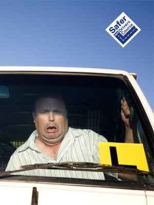 Nervous parent in the passenger seat with a learner driver in Sydney