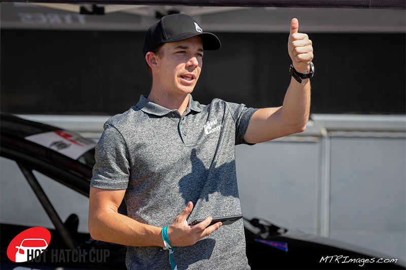 Professional Instructor, Dylan Cothill, displays a thumbs up gesture.
