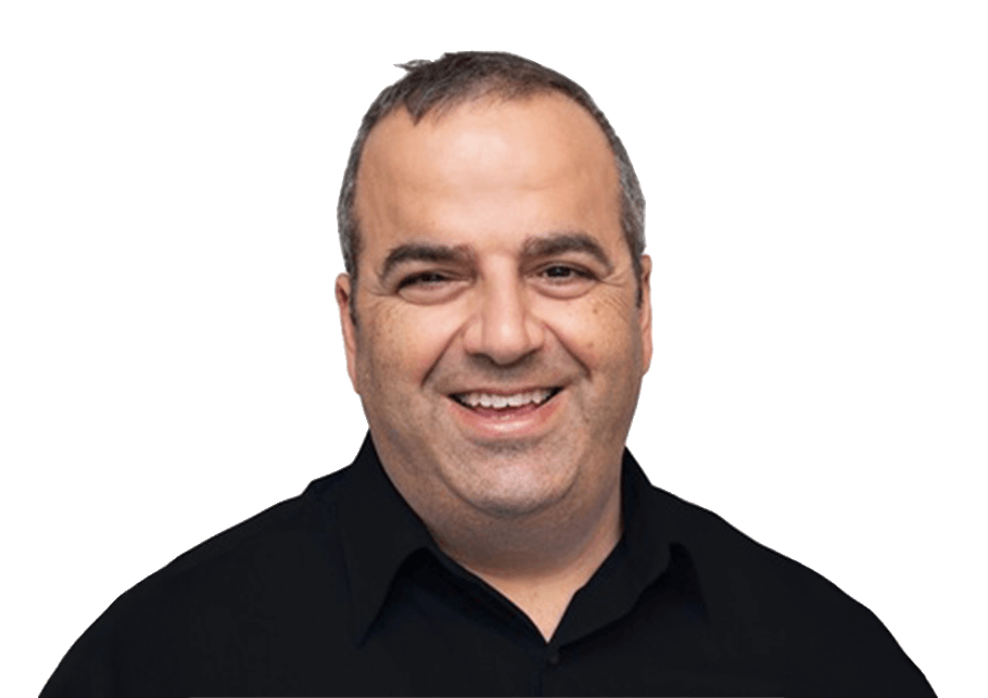 Instructor Fred of Legend Driving School in a professional black shirt, smiling.