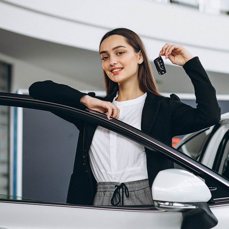 Happy woman on driving test.