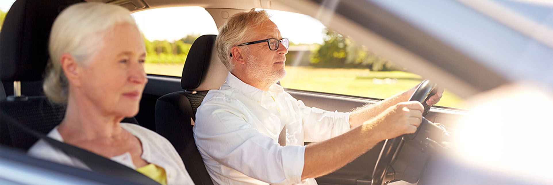 A happy student on a driving lesson with AAPEX Driving Academy.