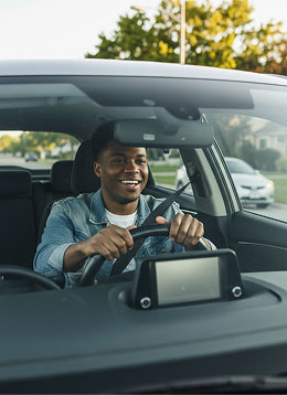 Smiling driver in car