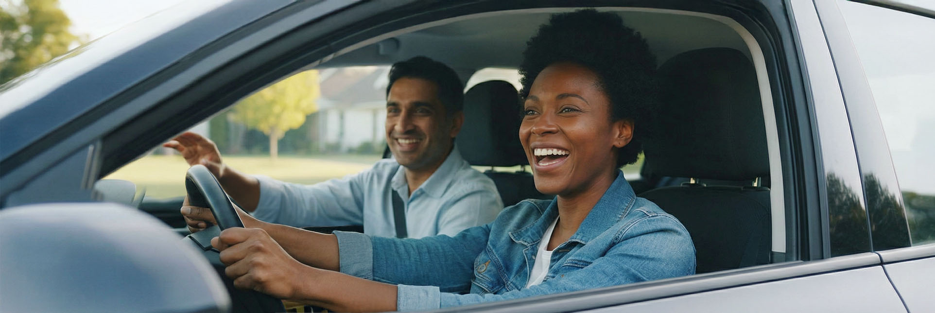 A happy student on a driving lesson with AAPEX Driving Academy.