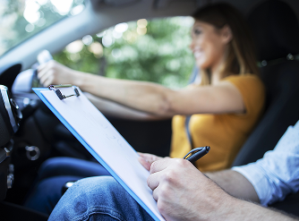Hands on steering wheel.