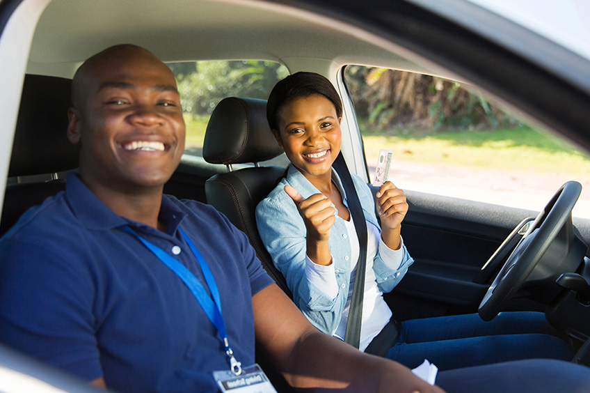 Happy student studies in a classroom session.