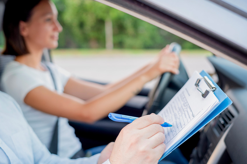 Happy student studies in a classroom session.