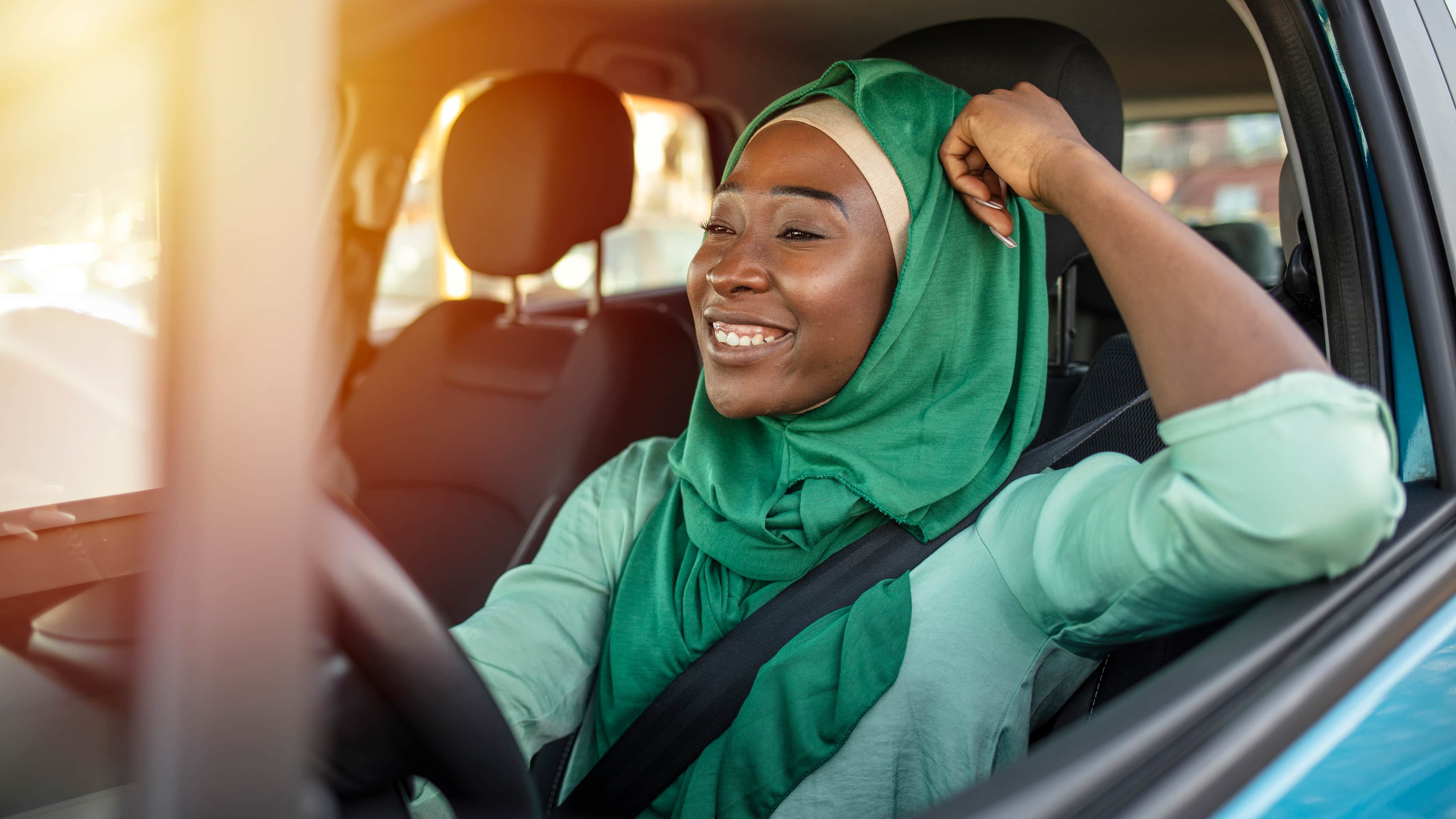 Happy student studying for comprehensive beginner driver education program with AAPEX Driving Academy.
