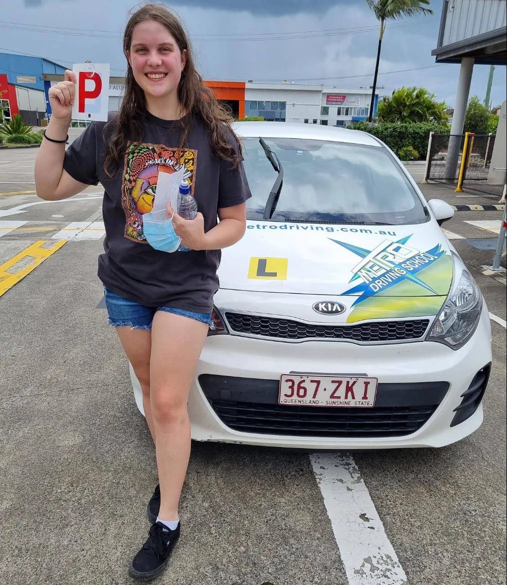 A happy new driver after passing the driving test with Metro Driving School