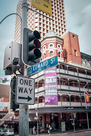 Street scene with traffic lights and road signs