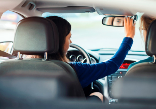 Instructor evaluating a driver