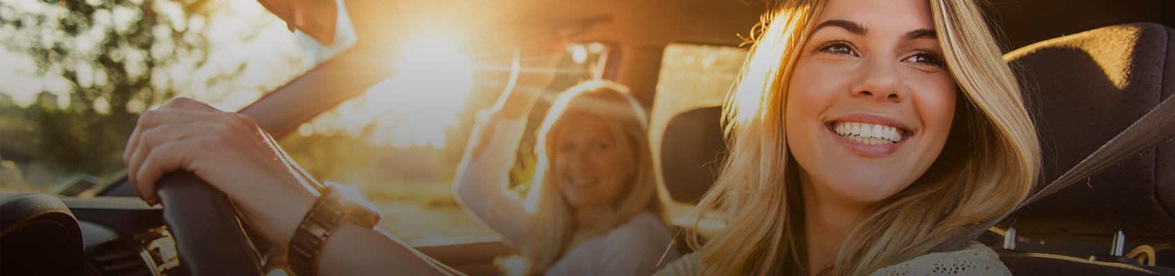 Smiling teen driver in the car during an AAA Licensed to Learn driving lesson.